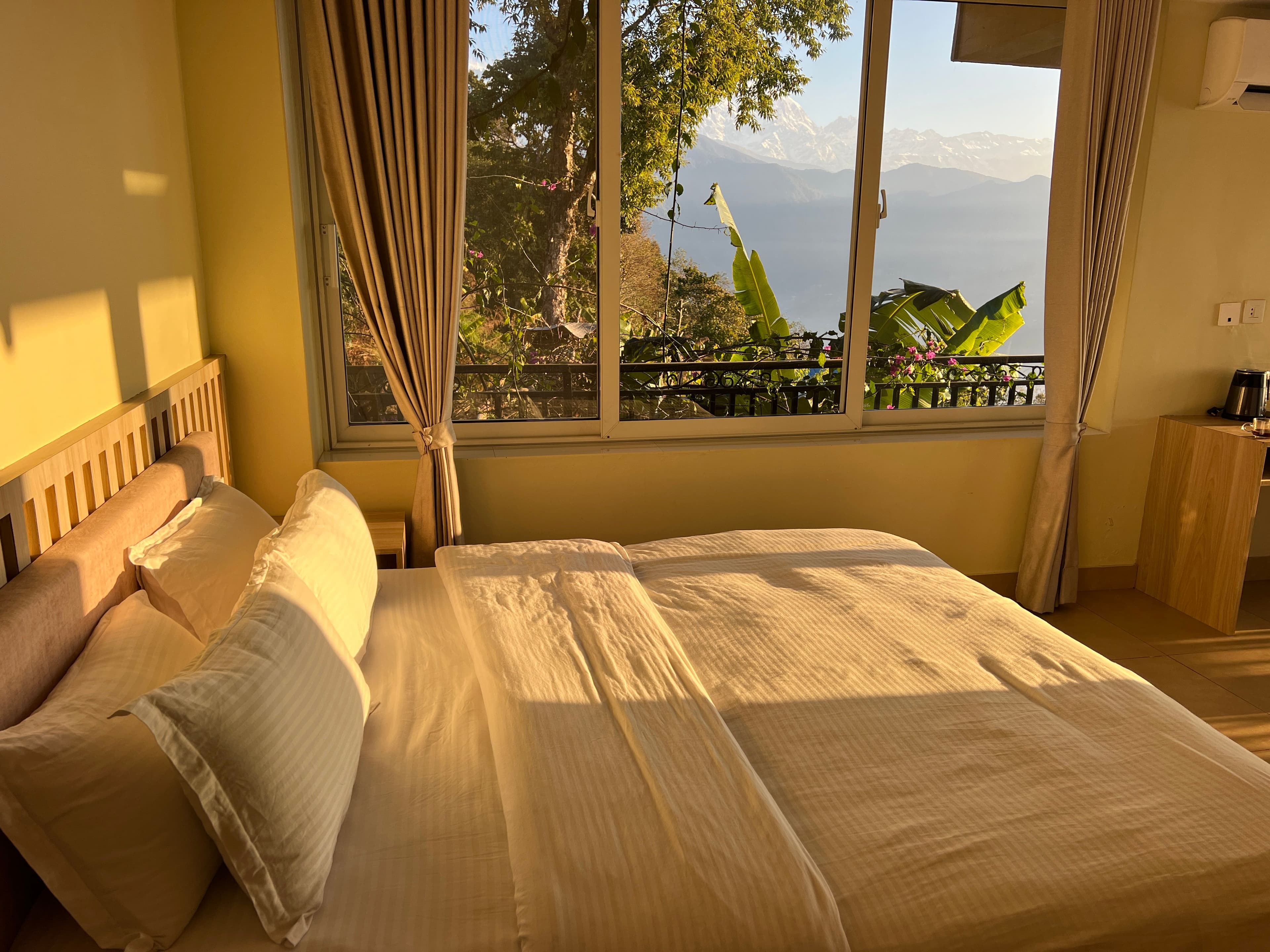 sunrise in bedroom with mountain view